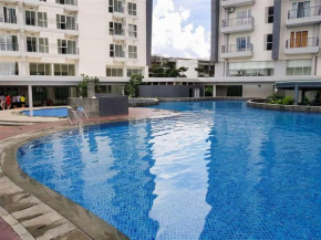 Modern and Strategic 2BR Casa De Parco Apartment near ICE BSD By Travelio